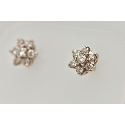 40 - A PAIR OF DIAMOND CLUSTER STUD EARRINGS, designed as two tiers of brilliant cut diamonds in claw set... 