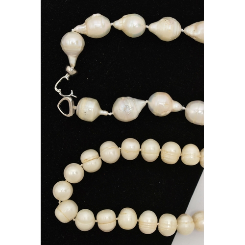 45 - TWO CULTURED BAROQUE PEARL NECKLACES, the first a white fire ball pearl necklace, fitted with a whit... 