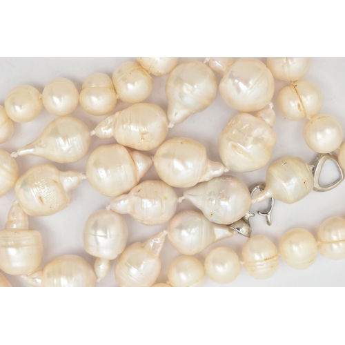 45 - TWO CULTURED BAROQUE PEARL NECKLACES, the first a white fire ball pearl necklace, fitted with a whit... 