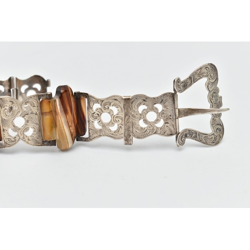 47 - A WHITE METAL BANDED AGATE BRACELET, in the form of a belt with buckle, designed as a series of whit... 