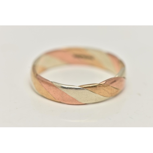 5 - A 9CT GOLD TRI COLOUR BAND RING, a twisted design of white, yellow and rose gold, approximate band w... 