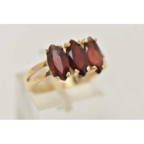 6 - A HUNGARIAN GEM SET RING, three marquise cut garnets, prong set in yellow metal, stamped 585, stampe... 