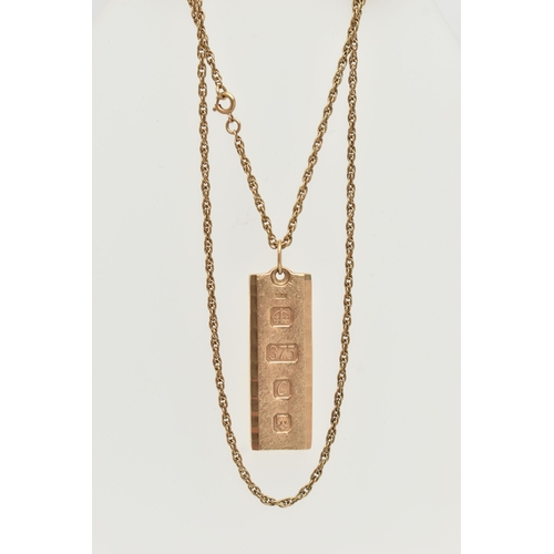 67 - A 9CT GOLD INGOT PENDANT WITH CHAIN, textured ingot hallmarked 9ct London 1977, fitted with a jump r... 