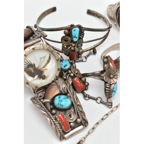 74 - WHITE METAL NAVAJO JEWELLERY, to include a cuff bangle set with coral, turquoise and a central bear ... 