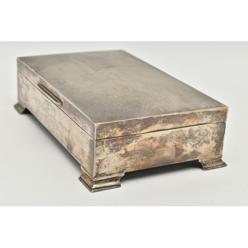 105 - A SILVER CIGARETTE BOX, of a rectangular form, engine turned pattern with personal engraving to the ... 