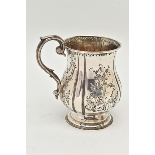 107 - A MID VICTORIAN SILVER CHRISTENING MUG, the bulbous outline embossed with foliate decoration and eng... 