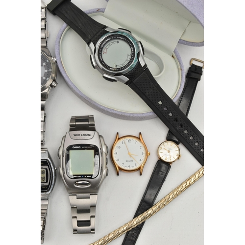 113 - A SELECTION OF WRISTWATCHES, to include a ladies 9ct gold manual wind watch, round silver dial, Arab... 