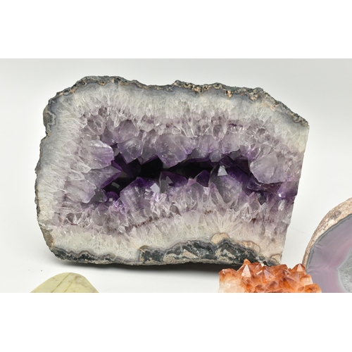 122 - FOUR GEMSTONE SPECIMENS, to include an amethyst geode, a citrine specimen, a split banded agate and ... 