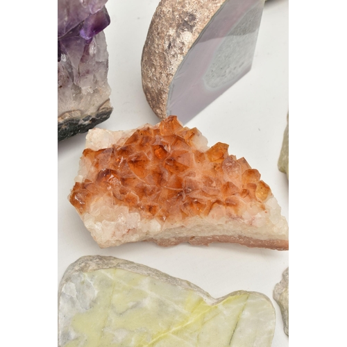 122 - FOUR GEMSTONE SPECIMENS, to include an amethyst geode, a citrine specimen, a split banded agate and ... 