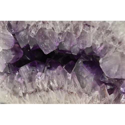 122 - FOUR GEMSTONE SPECIMENS, to include an amethyst geode, a citrine specimen, a split banded agate and ... 