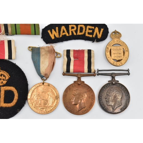 98 - A SMALL BAG OF MILITARY ITEMS, to include a WWI service medal, awarded to 'G-9373 C.SJT. W.S.PEARCE ... 