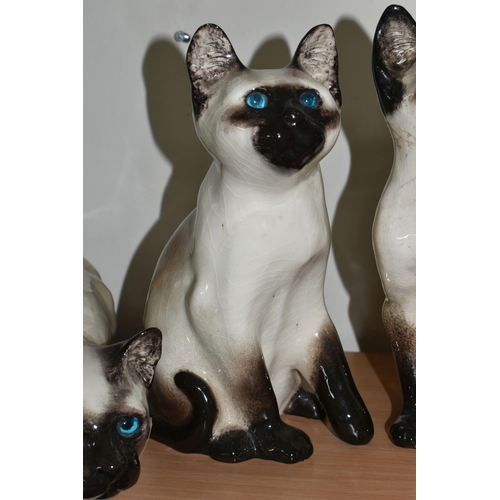 325 - A GROUP OF FOUR VINTAGE JENNY WINSTANLEY SIAMESE CATS, comprising Kensington Studio model 34, 31, 45... 