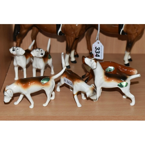 334 - A GROUP OF BESWICK FOX HUNTING FIGURES, comprising 'Huntsman Standing', model 1501, together with a ... 