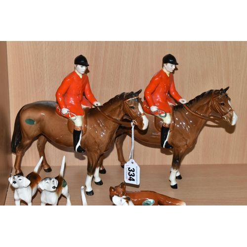 334 - A GROUP OF BESWICK FOX HUNTING FIGURES, comprising 'Huntsman Standing', model 1501, together with a ... 