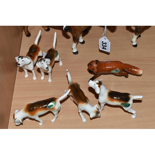 334 - A GROUP OF BESWICK FOX HUNTING FIGURES, comprising 'Huntsman Standing', model 1501, together with a ... 