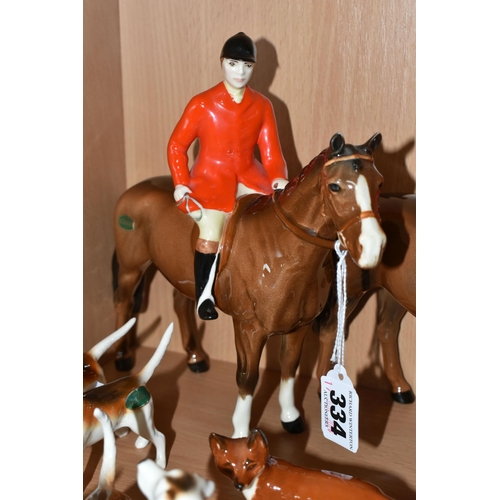 334 - A GROUP OF BESWICK FOX HUNTING FIGURES, comprising 'Huntsman Standing', model 1501, together with a ... 