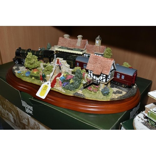 338 - TWO BOXED LILLIPUT LANE SCULPTURES, comprising a 'Bluebell Line' Illuminated Snow Cottage, code L279... 