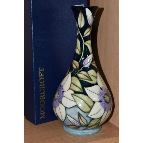 341 - A BOXED MOORCROFT POTTERY 'SOPHIE CHRISTINA' VASE, with elongated neck, tube lined with cream and li... 