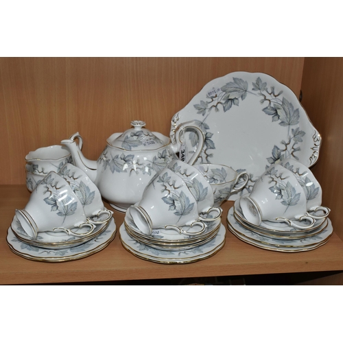 348 - A TWENTY FOUR PIECE ROYAL ALBERT 'SILVER MAPLE' TEA SET, comprising a teapot, a cream jug, a sugar b... 