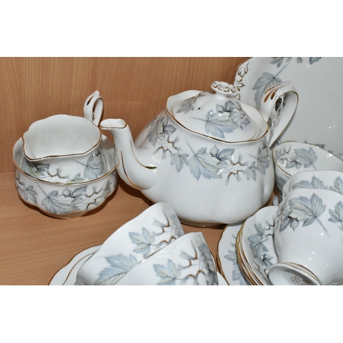 348 - A TWENTY FOUR PIECE ROYAL ALBERT 'SILVER MAPLE' TEA SET, comprising a teapot, a cream jug, a sugar b... 