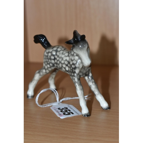 355 - A BESWICK ROCKING HORSE GREY FOAL, model 815: Small, Stretched, Facing Right, height 8cm (1) (Condit... 