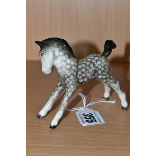 355 - A BESWICK ROCKING HORSE GREY FOAL, model 815: Small, Stretched, Facing Right, height 8cm (1) (Condit... 