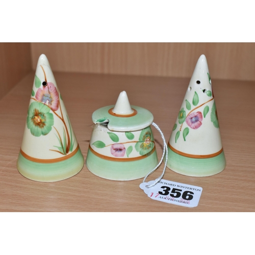 356 - A CLARICE CLIFF CONICAL CRUET SET, painted with tan trees of pink and green flowers, with green and ... 