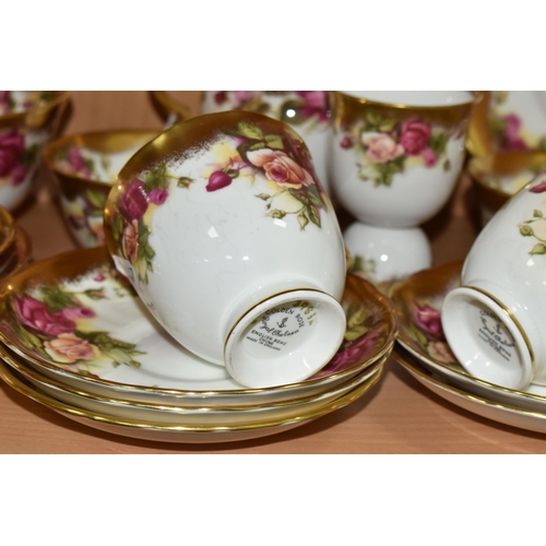 360 - A TWENTY FIVE PIECE ROYAL CHELSEA 'GOLDEN ROSE' TEA SET, comprising a cake plate, a sugar bowl, a pr... 