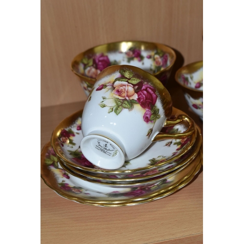 360 - A TWENTY FIVE PIECE ROYAL CHELSEA 'GOLDEN ROSE' TEA SET, comprising a cake plate, a sugar bowl, a pr... 