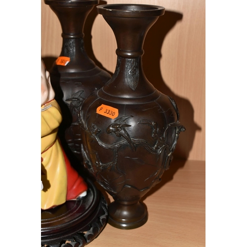 364 - A GROUP OF ORIENTAL ITEMS, to include a pair of bronzed vases, height 26cm (one with small hole in t... 