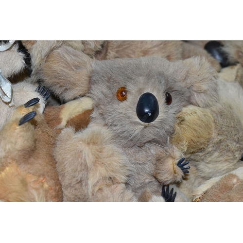 393 - A LARGE QUANTITY OF ASSORTED KOALA BEAR TOYS, assorted sizes and types and eras, also includes a sma... 