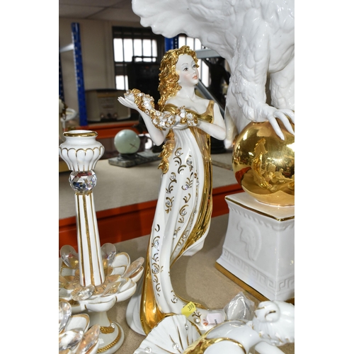 398 - A CAPODIMONTE FIGURINE SET consisting of white porcelain figurines with gilded and embellished featu... 