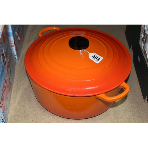 403 - A LARGE ORANGE LE CREUSET 28cm CASSEROLE POT in fair condition with lid (1)