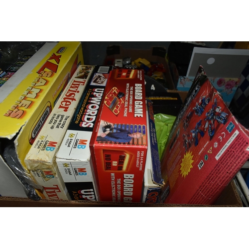 415 - FOUR BOXES AND LOOSE TOYS, GAMES AND PUZZLES, to include Hasbro Transformers Ultra Magnus,  Nintendo... 