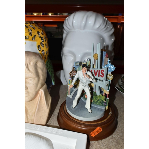 421 - A QUANTITY OF ELVIS DECORATIVE ORNAMENTS to include ten free standing Elvis busts of various sizes a... 