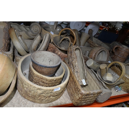 422 - A LARGE QUANTITY OF HILLSTONIA STONEWARE to include a variety of assorted jugs, vases, and planters ... 