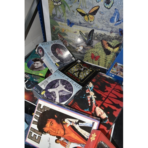 427 - TWO BOXES AND LOOSE GAMES, JIGSAWS AND POSTERS to include a large number of Elvis themed games and p... 