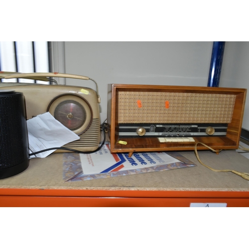 429 - A LARGE QUANTITY OF VINTAGE RADIOS, comprising three Bush portable FM radios, a TR130 Bush portable ... 