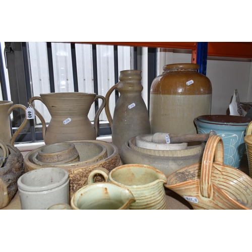 440 - A LARGE QUANTITY OF STONEWARE, approximately seventy pieces, comprising B.R Burton vases, jugs, bask... 