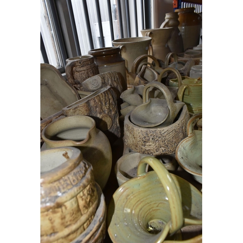 440 - A LARGE QUANTITY OF STONEWARE, approximately seventy pieces, comprising B.R Burton vases, jugs, bask... 