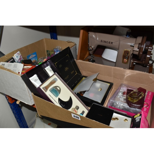 448 - TWO BOXES OF FRAGRANCES, KEYRINGS AND A SINGER SEWING MACHINE, to include a large collection of nove... 