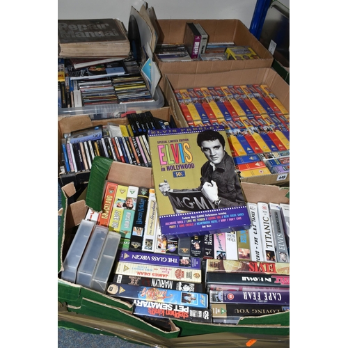 449 - FIVE BOXES OF VHS VIDEO CASSETTES AND CDs, over one hundred CDs, artists include Elvis, Roy Orbison,... 