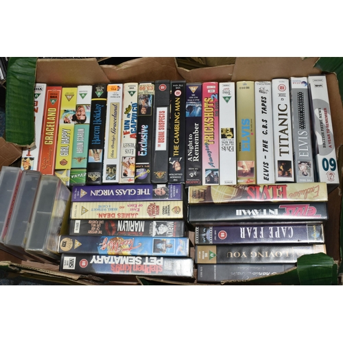 449 - FIVE BOXES OF VHS VIDEO CASSETTES AND CDs, over one hundred CDs, artists include Elvis, Roy Orbison,... 