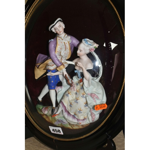 458 - A PAIR OF FRAMED AND GLAZED RELIEF PORCELAIN FIGURE GROUPS, each depicting a courting couple, mounte... 