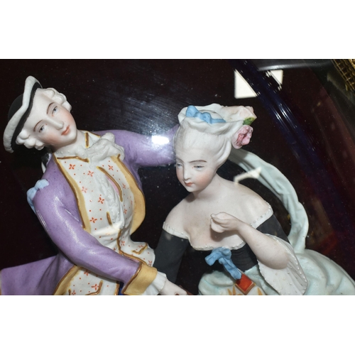 458 - A PAIR OF FRAMED AND GLAZED RELIEF PORCELAIN FIGURE GROUPS, each depicting a courting couple, mounte... 