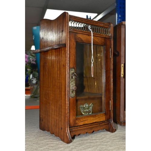 467 - A VICTORIAN MICROSCOPE AND AN OAK SMOKER'S CABINET, comprising a wooden cased microscope with two le... 