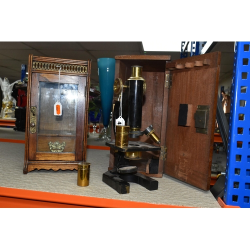 467 - A VICTORIAN MICROSCOPE AND AN OAK SMOKER'S CABINET, comprising a wooden cased microscope with two le... 