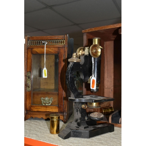 467 - A VICTORIAN MICROSCOPE AND AN OAK SMOKER'S CABINET, comprising a wooden cased microscope with two le... 