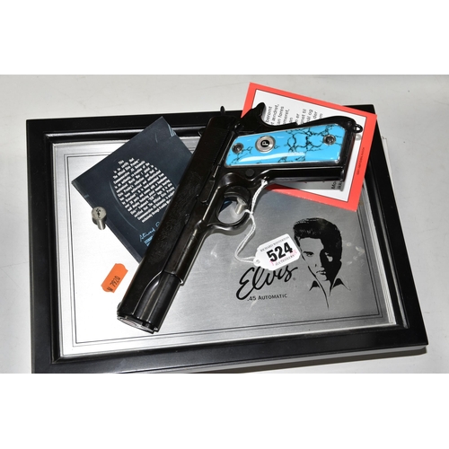 524 - A FRANKLIN MINT REPLICA ELVIS PRESLEY COLT 45 PISTOL, the pistol is of metal construction and has be... 