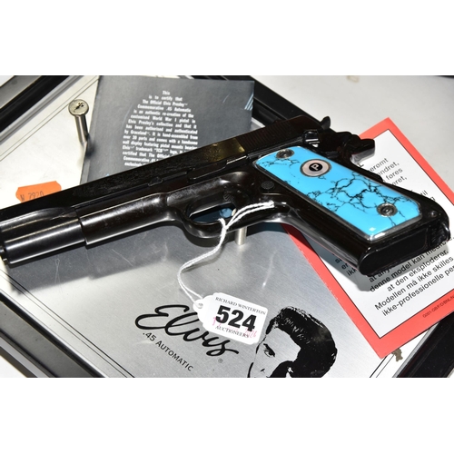 524 - A FRANKLIN MINT REPLICA ELVIS PRESLEY COLT 45 PISTOL, the pistol is of metal construction and has be... 